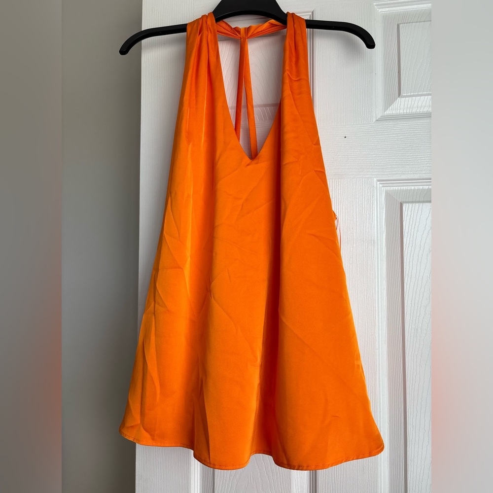 1. State Orange Sleeveless Blouse